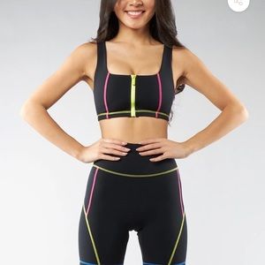 NWT. Buff Bunny. Dive Zip Sports Bra. M. Onyx black/multi. Sold out.